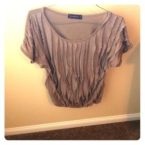 Must be sold by 8/10/18! Beige ruffled blouse